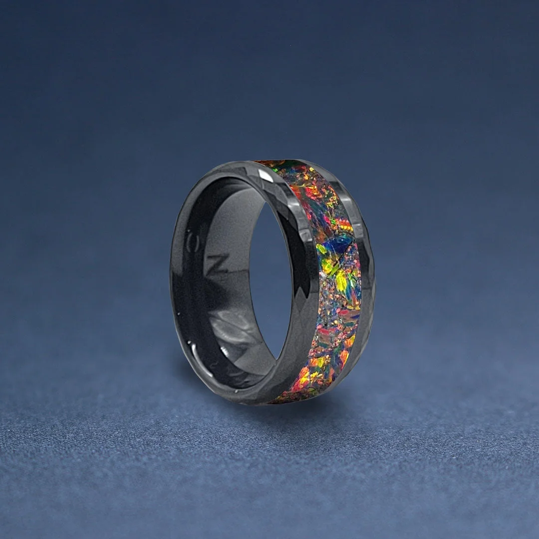 Handcrafted black ring with a colourful fire-opal inlay by Norquay Jewellers